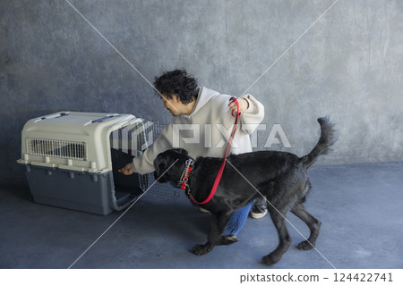 Man training a dog Man training a dog 124422741