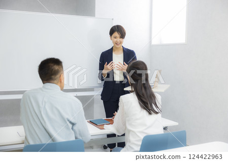 A couple attending a seminar or information session 124422963