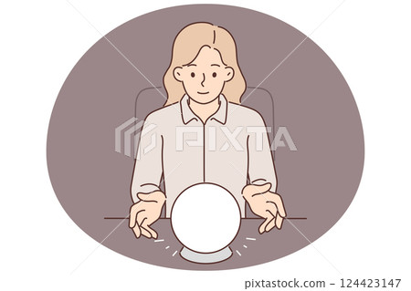 Woman uses crystal ball to predict future during seance and provide psychic services 124423147