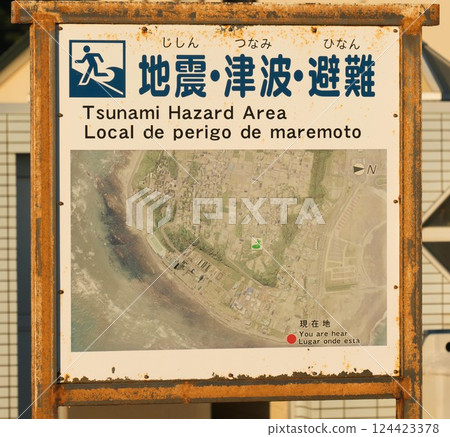 Earthquake, tsunami and evacuation warning signs Earthquake, tsunami and evacuation warning signs 124423378