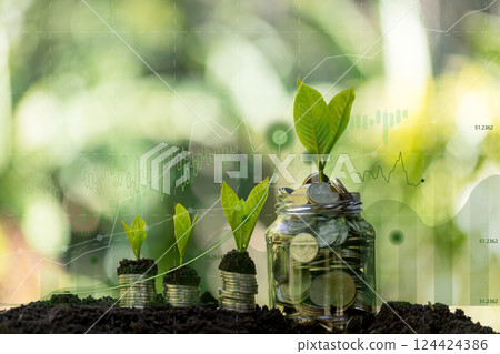 Growing money, finance and investment. Seedling are growing with business arrow of growth. Young plants on coin stacks increase. Concept of economy green growth, profit, development and success. Growing money, finance and investment. Seedling are growing with business arrow of growth. Young plants on coin stacks increase. Concept of economy green growth, profit, development and success. 124424386