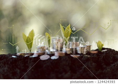 Growing money, finance and investment. Seedling are growing with business arrow of growth. Young plants on coin stacks increase. Concept of economy green growth, profit, development and success. Growing money, finance and investment. Seedling are growing with business arrow of growth. Young plants on coin stacks increase. Concept of economy green growth, profit, development and success. 124424393