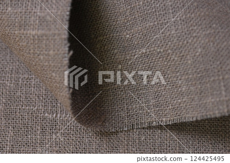 drak brown hemp viscose natural fabric cloth color, sackcloth rough texture of textile fashion 124425495