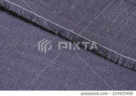 dark beige hemp viscose natural fabric cloth color; sackcloth rough texture of textile fashion dark beige hemp viscose natural fabric cloth color; sackcloth rough texture of textile fashion 124425499