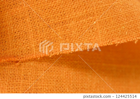 orange hemp viscose natural fabric cloth color, sackcloth rough texture of textile fashion 124425514