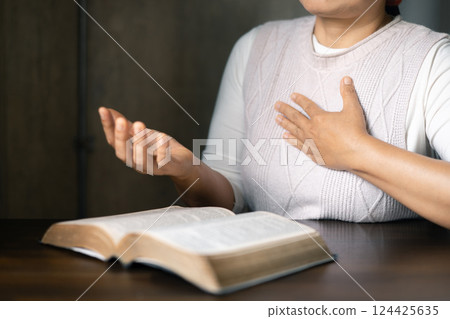Woman pray for god blessing to wishing have better life. Female hands worship to god. Woman hands praying to god. Christian life crisis prayer to god. begging for forgiveness and believe in goodness. Woman pray for god blessing to wishing have better life. Female hands worship to god. Woman hands praying to god. Christian life crisis prayer to god. begging for forgiveness and believe in goodness. 124425635