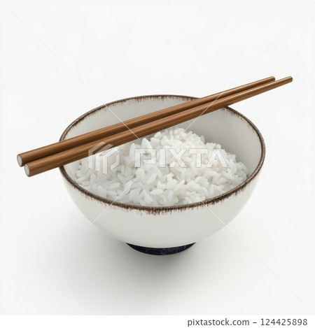 A bowl of white rice with chopsticks in it 124425898