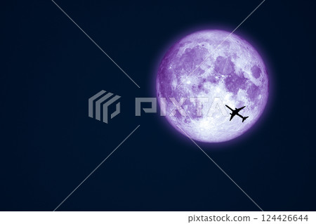 Full Worm blue Moon and silhouette airplane flight on night sky Full Worm blue Moon and silhouette airplane flight on night sky 124426644