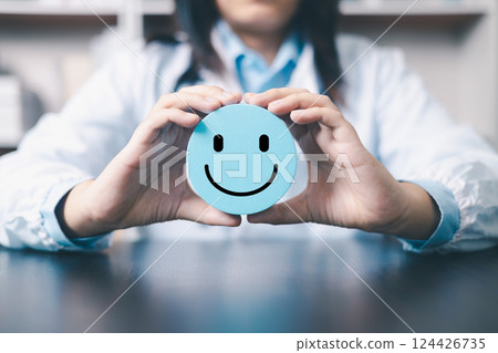 Therapy and care from the doctor, the patient's health improved, bringing satisfaction and a happy smile to their face as they left the hospital, their brain thinking positively about their recovery. 124426735
