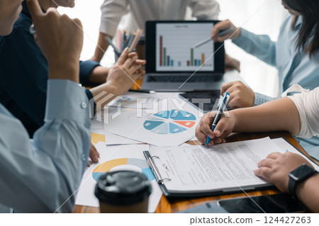 Financial analyst presented a detailed data analysis graph to their colleague, corporate office, demonstrating the business's financial status and trends. Concept of business data analysis. Financial analyst presented a detailed data analysis graph to their colleague, corporate office, demonstrating the business's financial status and trends. Concept of business data analysis. 124427263