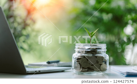 Green business practices and alternative energy investments are attracting eco-conscious investors, driving sustainable finance and building long-term wealth through responsible use of money. 124427574