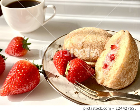 Delicious looking sweets and fresh strawberries on the table 124427653