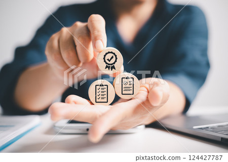 Business management team conducted thorough quality check and evaluation, confirming approval with mark of assurance and satisfaction. approval, check, quality, business, management, mark, assurance. 124427787