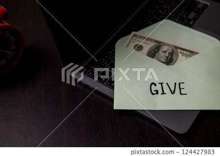 Carefully budgeting her money, she placed cash into separate envelopes for giving, business expenses, and personal finance, ensuring she could pay for everything with ease, straight from her purse. 124427983