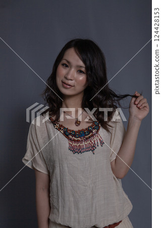 A woman with a condomise 124428153