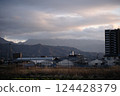 Mountains seen from the city at dusk in winter 124428379