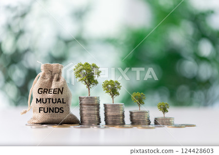 Green bonds and ESG investments, businesses recognize potential to positively impact economy and nature, against background of evolving market prices and rise of sustainable finance valuable coin. 124428603