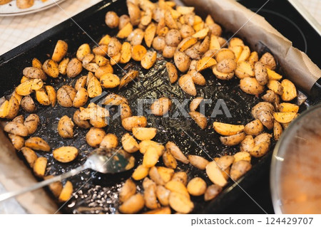Roasted Baby Potatoes, seasoned with a blend of Herbs and Spices for added flavor and taste 124429707