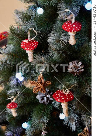 Charming and delightful Christmas Tree Decorations featuring beautiful Red Mushroom Ornaments Charming and delightful Christmas Tree Decorations featuring beautiful Red Mushroom Ornaments 124429736
