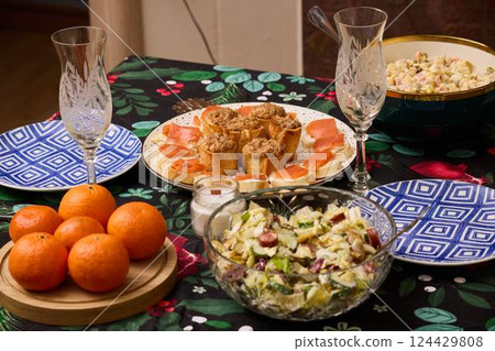 A Festive Table Setting with Delicious Food and Refreshing Drinks for Your Enjoyment A Festive Table Setting with Delicious Food and Refreshing Drinks for Your Enjoyment 124429808