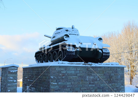 A Stunning SnowCovered T34 Tank Monument Rising Amidst a Beautiful Winter Landscape 124429847
