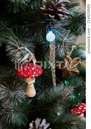Charming Christmas Tree Decorations with Adorable Mushrooms and Beautiful Pinecones Charming Christmas Tree Decorations with Adorable Mushrooms and Beautiful Pinecones 124429989