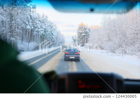 A Winter Drive Through a Picturesque Snowy Landscape Filled with Wonder and Beauty 124430005