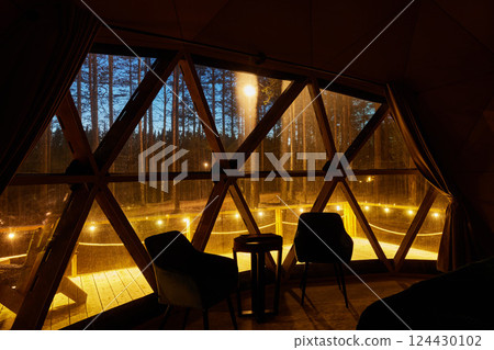 A Cozy Geometric Cabin Nestled Among Nature at Dusk, Perfect for Ultimate Relaxation and Comfort 124430102