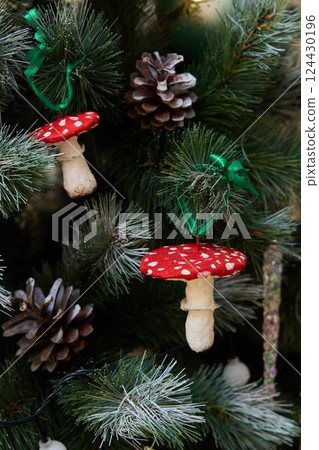 Enjoy a delightful and festive Christmas Tree Decor that features unique Mushroom Ornaments 124430196