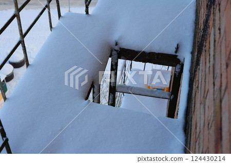 Experience the enchanting beauty of a scenic Winter Wonderland with a snowcovered stairway Experience the enchanting beauty of a scenic Winter Wonderland with a snowcovered stairway 124430214