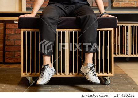 This is a stylish and minimalist furniture piece that comes equipped with convenient wheels 124430232