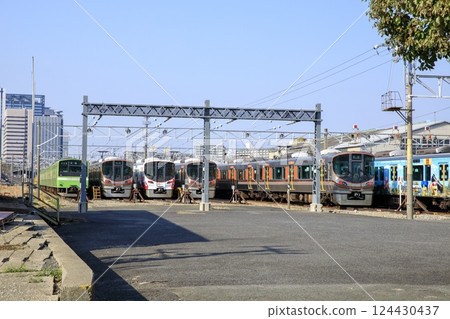 Osaka Loop Line trains parked at Morinomiya Train Depot 124430437