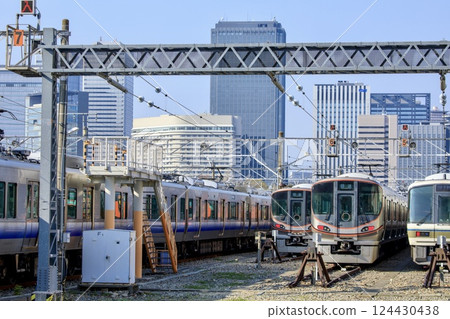 Osaka Loop Line trains parked at Morinomiya Train Depot 124430438