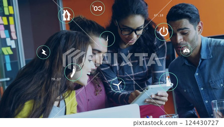 Image of ecology icons and data processing over diverse colleagues discussing work in office 124430727