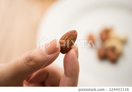 Eating nuts Eating nuts 124431116