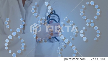 Holding stethoscope, medical professional with DNA strand image over Holding stethoscope, medical professional with DNA strand image over 124431481