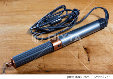 Modern electric hair styler with attachment 124431768