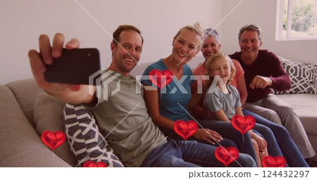 Taking selfie, family sitting on couch with floating red heart images Taking selfie, family sitting on couch with floating red heart images 124432297