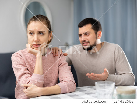 Young adult couple quarreling at home 124432595