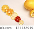 Dried citrus fruits on a table 124432949