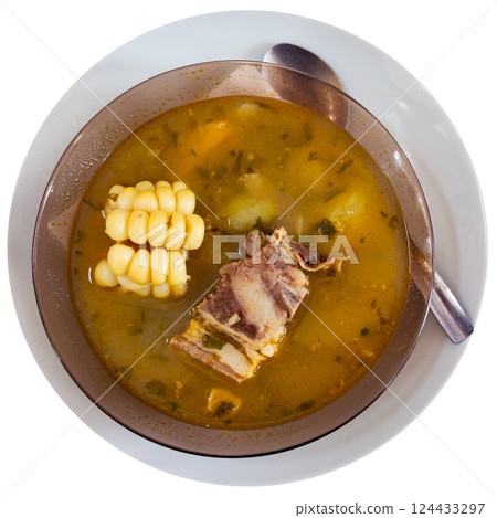 Plate is filled to brim with hot sanchez soup, traditional dish of Latin American cuisine. 124433297
