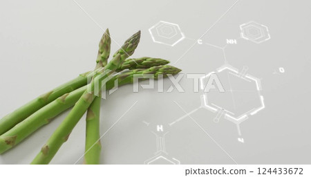 Image of chemical formula over asparagus 124433672