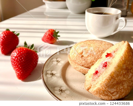 Delicious looking sweets and cute strawberries on the table 124433686