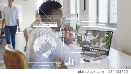 Image of data processing over diverse colleagues having image call in office Image of data processing over diverse colleagues having image call in office 124433723