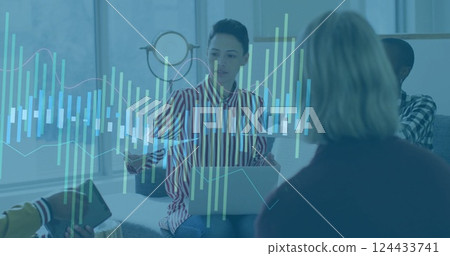 Image of financial data processing over diverse colleagues discussing work in office 124433741