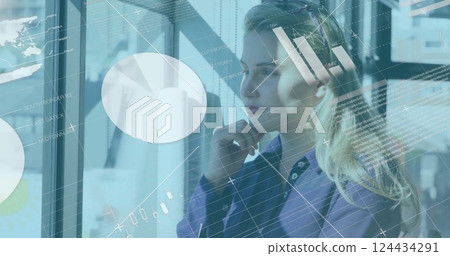 Image of financial data processing over caucasian businesswoman in office 124434291