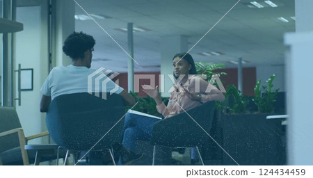 Image of financial data processing over diverse business people in office Image of financial data processing over diverse business people in office 124434459