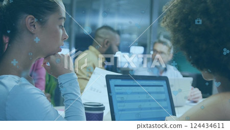 Image of financial data processing over diverse business people in office 124434611