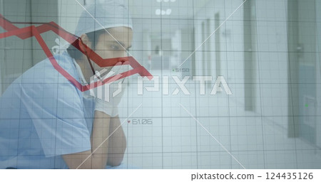 Image of diagrams over caucasian male doctor sitting in hospital Image of diagrams over caucasian male doctor sitting in hospital 124435126