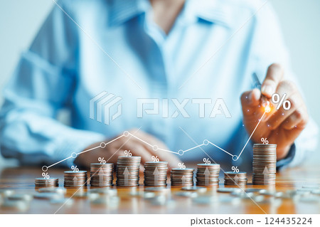 Businesswoman is calculating income and return on investment in percentage. Interest rate and dividend concept, income, return, retirement, compensation fund, investment, dividend tax, stock market Businesswoman is calculating income and return on investment in percentage. Interest rate and dividend concept, income, return, retirement, compensation fund, investment, dividend tax, stock market 124435224